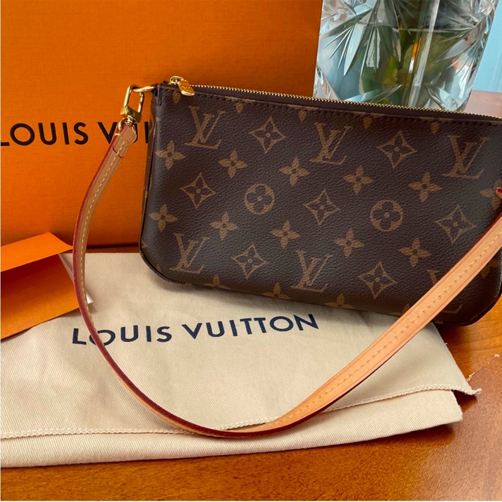 Louis Vuitton pouchette new hard to find!comes w/authentic box,papers & dust-bag